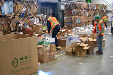 Alys and Bill sorting in the bale storage area